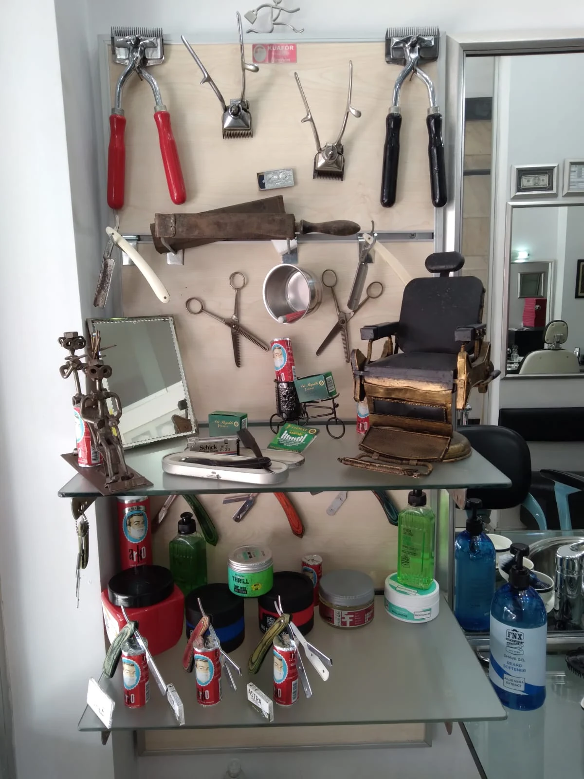 Vintage barber tools displayed inside Rimedzo Barber Shop